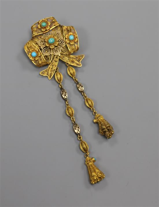 A Victorian filigree yellow metal and turquoise mounted tassel drop brooch, 9cm.